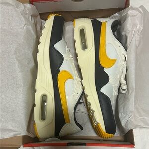 Nike Air Max Shoes in Black, White, and Yellow